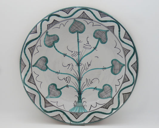 Piatto a catino in maiolica arcaica dipinto a mano, albero con foglie a cuore verde rame e manganese – Ceramiche Polidori